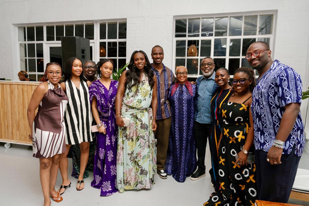Tunji Idowu with family at an evening gathering
